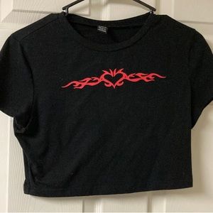 black crop top from SHEIN size large on the front has heart flame